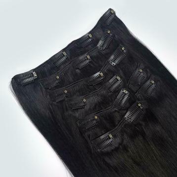 Zwarte (#1 Jet Black) clip in hair extensions van echt haar