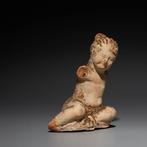 Oud-Grieks Terracotta Kind. 4e eeuw v.Chr. 6 cm hoog.