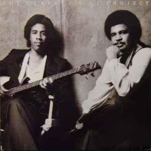 LP gebruikt - Stanley Clarke/George Duke - The Clarke / D..., Cd's en Dvd's, Vinyl | Rock, Zo goed als nieuw, Verzenden