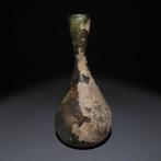 Oud-Romeins Glas Fles. 3e eeuw na Christus. 15,5 cm hoogte.