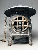 Dit is een hangende ronde lantaarn - IJzer (gegoten/gesmeed)