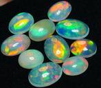 4,67 ct - Topkleuren - 10 natuurlijke opalen - Cabochon -