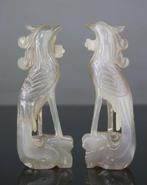 Paar gesculpteerde beeldjes van feniks en vogels, sculpturen