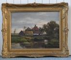 Chris van der Windt (1877-1952) - Een Hollands landschap met