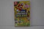 New Super Mario Bros U - Deluxe NEW (SWITCH UKV), Verzenden, Zo goed als nieuw