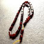 Tesbih-gebedssnoer, barrelvormig, donker cognackleurig. -