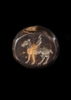 West-Aziatisch Donkerbruine hardsteen Stempel met gevleugeld