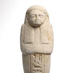 Oud-Egyptisch Kalksteen Shabti ingeschreven voor Henut-Weret