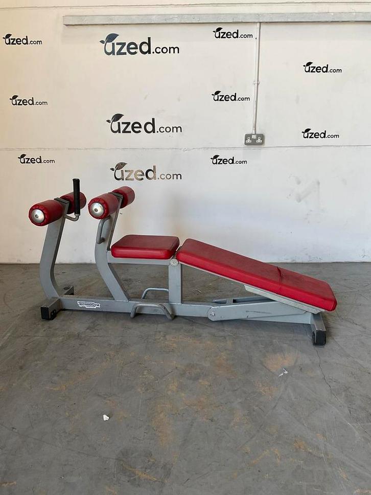 Technogym Pure Adjustable Decline/Ab Crunch - Silver/Red, Sport en Fitness, Fitnessapparatuur, Gebruikt