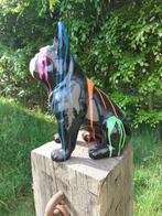 Beeld, pub or French bulldog black sitting in color paint