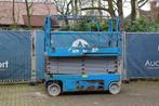 Veiling: Schaarlift Genie GS-3246 Elektrisch 11.75m 2011, Zakelijke goederen, Machines en Bouw | Liften, Steigers en Ladders, Ophalen