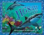 Jigsaw ocean by Anne Sharp (Big book), Gelezen, Anne Sharp is a highly successful illustrator whose first book for Macmillan, Dinosaur Park (0 333 72304 X), has sold over 200,000 copies. Also in this jigsaw series are Jigsaw Dinosaurs (0 333 78150 3) and Jigsaw Safari (0 333 94918 8). Anne is currently working on Pop-Up Minibeast Adventure (0 333 96395 4), which will be published in October 2002. As well as painting, Anne enjoys singing and spending time outdoors.