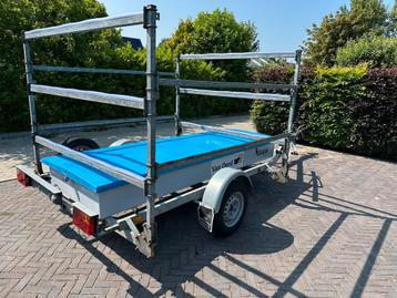 Kalf dubbel / triple boottrailer geremd met grote opbergkist beschikbaar voor biedingen