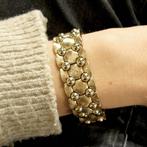 Vintage gouden brede schakelarmband, Sieraden, Tassen en Uiterlijk, Armbanden, Ophalen of Verzenden, Gebruikt, Overige kleuren