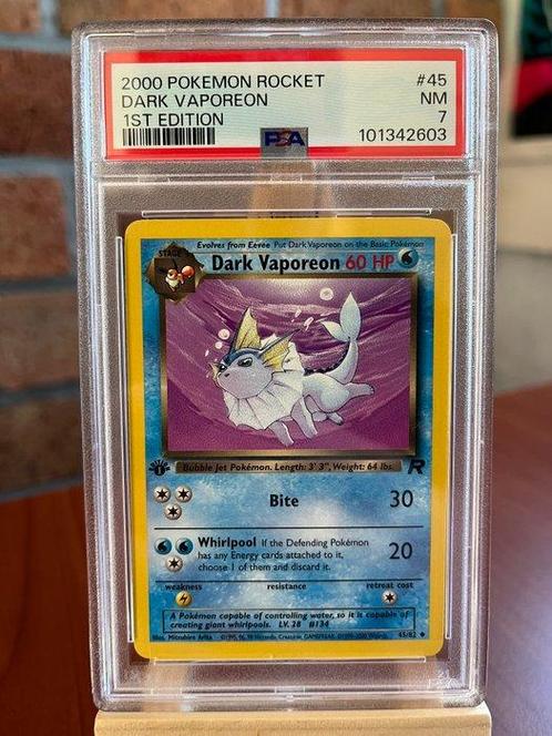 Pokémon Graded card - DARK VAPOREON 1ST EDITION TEAM ROCKET, Hobby en Vrije tijd, Verzamelkaartspellen | Pokémon