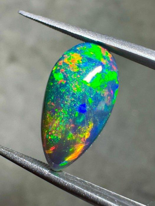 Natuurlijke zwarte opaal uit Ethiopië, gerookt. 3,76 karaat., Verzamelen, Mineralen en Fossielen