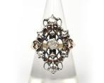 Een 14 krt. geelgouden ring met zilver en diamant, Gebruikt