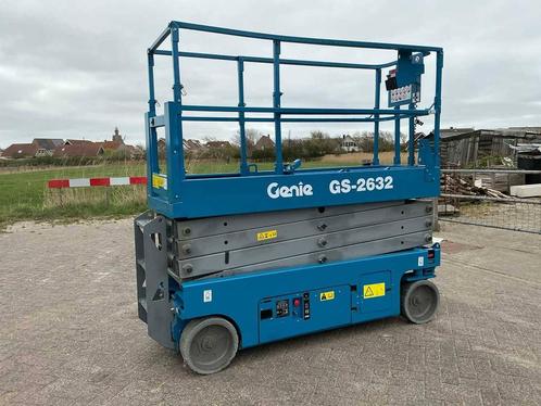 Veiling: Schaarlift Genie GS-2632 Elektrisch 9.96m 1999, Zakelijke goederen, Machines en Bouw | Liften, Steigers en Ladders, Ophalen