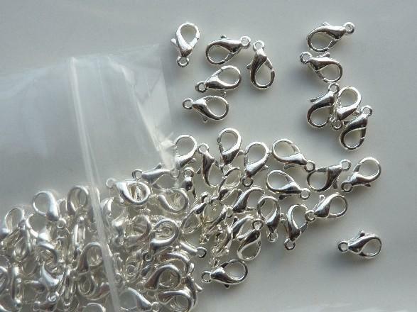 100 stuks karabijnersluitingen 12mm zilverkleur - GOEDKOOP!, Hobby en Vrije tijd, Kralen en Sieraden maken, Overige typen, Nieuw