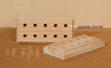 Capsulehouder van hout beschikbaar voor biedingen