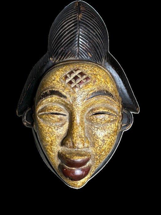 Zeldzame Afrikaanse Punu-maske met geel gepigmenteerd,, Antiek en Kunst, Kunst | Niet-Westerse kunst