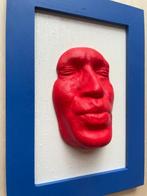 Small red kiss on white background-blue frame