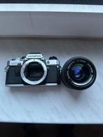 Olympus OM 10 + Zuiko 35-70 mm f 1:4 Single lens reflex, Audio, Tv en Foto, Fotocamera's Analoog, Nieuw