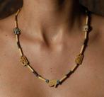 Oud-Egypte ketting met gele geglazuurde udjat amuletten -
