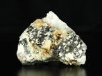Arsenopyriet met fluorescerende calciet en kwarts