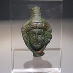Oud-Romeins Brons Vrouwelijk masker. 10,5 cm H. 1e - 2e eeuw