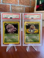 Pokémon Graded card - WEEZING & ARBOK 1ST EDITION TEAM, Hobby en Vrije tijd, Verzamelkaartspellen | Pokémon, Nieuw