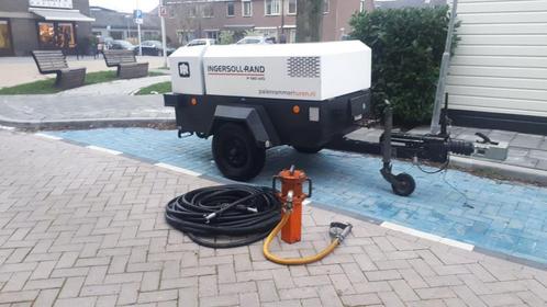 TE HUUR /HUREN palenrammer pneumatisch lucht schuttingpalen, Tuin en Terras, Schuttingen, Nieuw, Ophalen