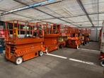 Schaarliften grote voorraad. JLG Skyjack Genie Hauotte, Zakelijke goederen, Machines en Bouw | Liften, Steigers en Ladders