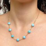 Halsketting met 7 larimar-ruiten, bloemvormige schaaltjes,