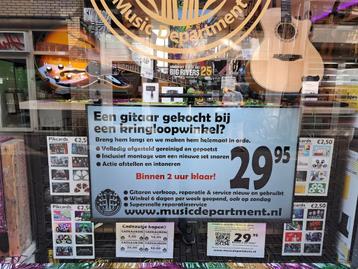 Je nieuwe gitaar wel of niet online kopen? Music Department beschikbaar voor biedingen
