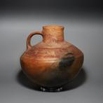 Muisca Terracotta Bolvormige kruik met handvat. 600-1400