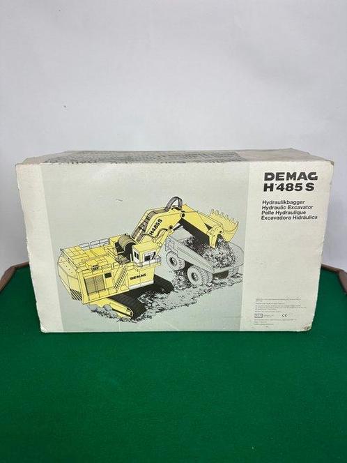 NZG - Modelauto - Mining hydraulic excavator DEMAG H 485 S -, Hobby en Vrije tijd, Modelauto's | 1:5 tot 1:12