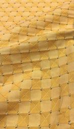 Jacquardweefsel rijkelijk bewerkt met een regelmatig