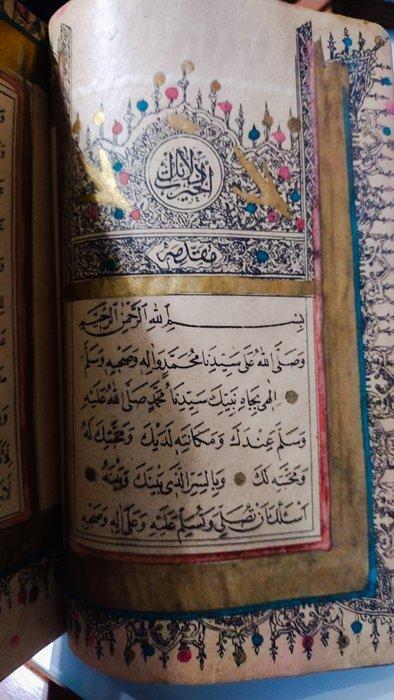 Autore sconosciuto - Testo religioso in arabo decorato in, Antiek en Kunst, Antiek | Boeken en Bijbels