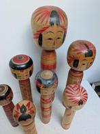 Een prachtige verzameling vintage Kokeshi in verschillende