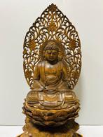 Fine sculptured wooden Amida Nyorai statue sitting on lotus