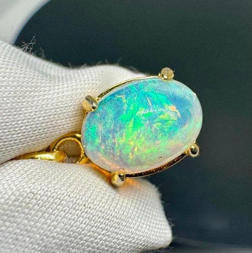 Opaal Cabochon - Hoogte: 19.5 mm - Breedte: 8.5 mm- 1.29 g -, Verzamelen, Mineralen en Fossielen