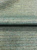 Prachtig geweven, kleurrijk textiel met een ruwe