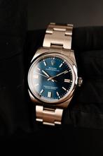 Rolex Oyster Perpetual 36 126000 uit 2021, Sieraden, Tassen en Uiterlijk, Horloges | Heren, Verzenden, Gebruikt, Polshorloge, Rolex