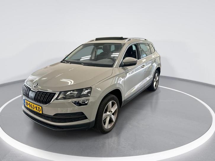 Zakelijke Lease |  Škoda Karoq 1.0 TSI 115pk DSG Ambition Bu, Auto's, Skoda, Lease, Grijs, Automaat, SUV of Terreinwagen, Overige kleuren