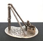 Heistelling met heibaas - Miniatuur beeldje - .835 zilver,
