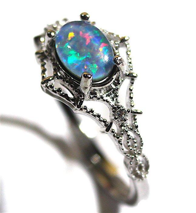 Geen minimumprijs - Ct. 9.10 Australische Triplet Opal In, Verzamelen, Mineralen en Fossielen