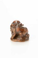 Een mooie boxwood netsuke van een karashishi met open mond