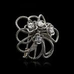 Broche Boucheron vintage witgouden bloemrijke broche met