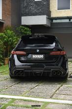 dit betreft een BMW G99 M5 Touring Carbon dak spoiler lip, Verzenden
